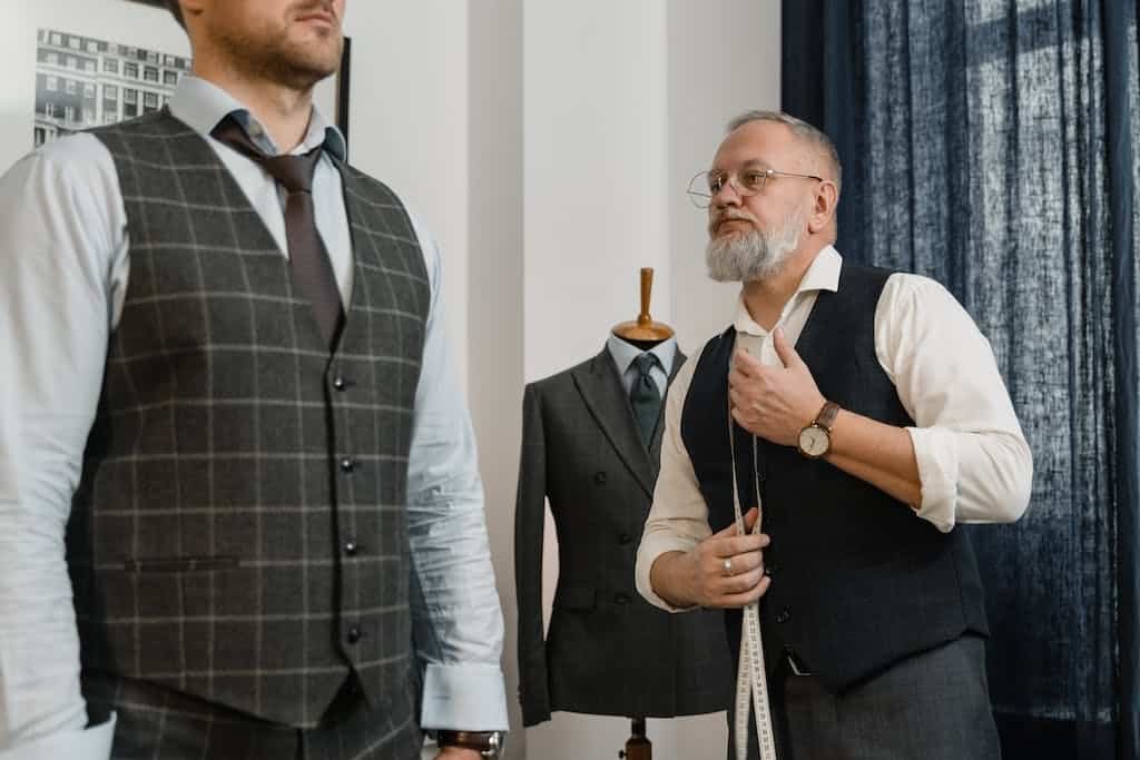 Tailor Looking at His Client